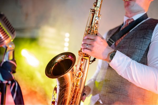 men playing saxophone